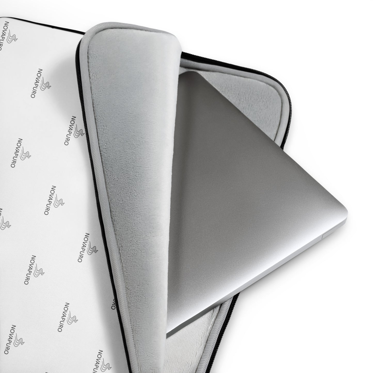 Premium white laptop sleeve featuring a repeating black Novapuro logo pattern, minimalist Scandinavian tech accessory with faux fur lining.