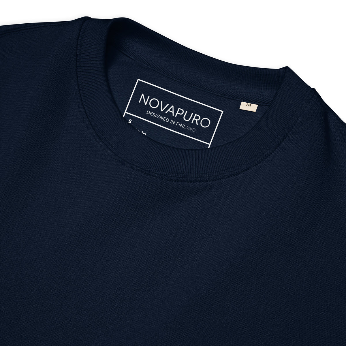 Custom Novapuro inside neck label detail on a sustainable organic cotton garment.