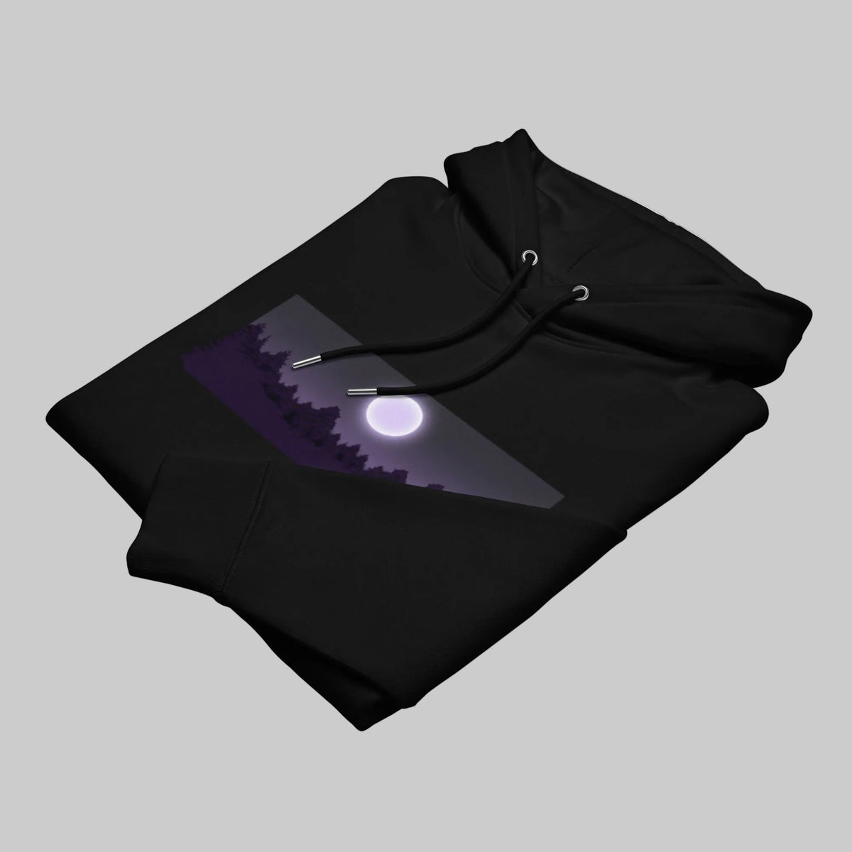 Folded black premium eco hoodie by Novapuro displaying the mystical purple night forest chest print.
