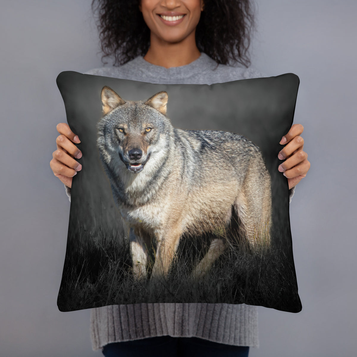 Angled view of the soft, shape-retaining premium throw pillow with a majestic wolf design. Elegant home accessory with a seamless print and hidden zipper.   