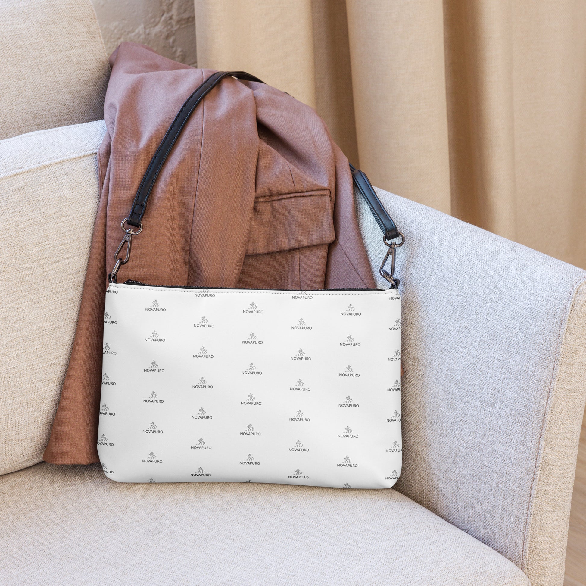 Novapuro Signature Monogram Crossbody Bag - Minimalist Nordic design with repeating logo pattern on premium faux leather.