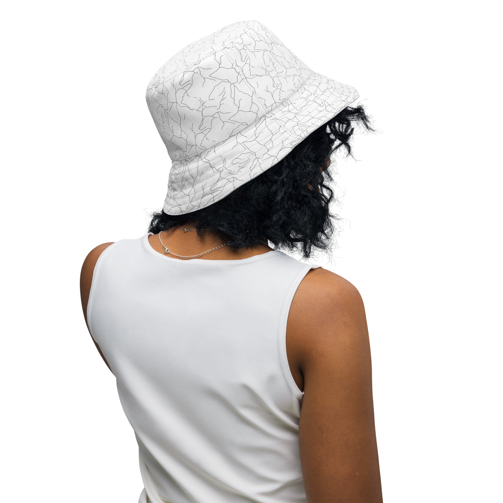 Versatile minimalist reversible bucket hat showcasing a clean Nordic aesthetic and abstract Spring Ice pattern, designed for sustainable streetwear by Novapuro