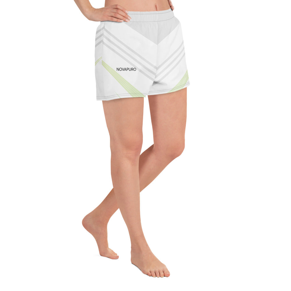Woman wearing fast-drying sustainable athletic shorts with geometric pattern and pockets