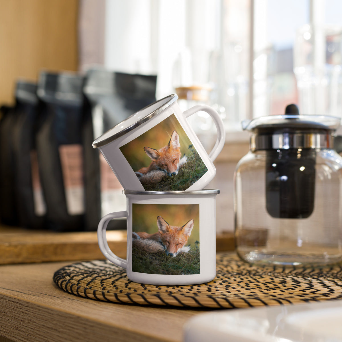 he Mikko Monto x Novapuro enamel mug displayed in a natural outdoor setting, highlighting its lightweight and portable design