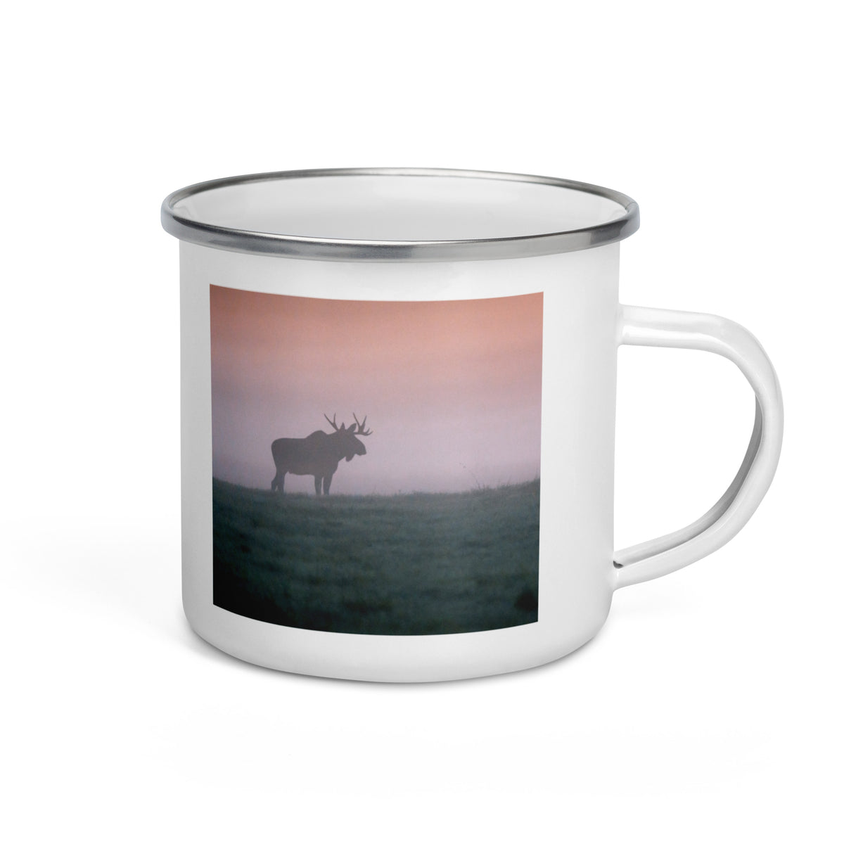 The Mikko Monto x Novapuro enamel mug displayed in a natural outdoor setting, highlighting its lightweight and portable design