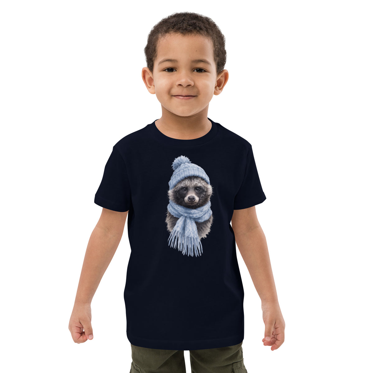 Young boy wearing the French Navy Annette Thome Marttinen x Novapuro organic kids t-shirt featuring a playful wolf design   