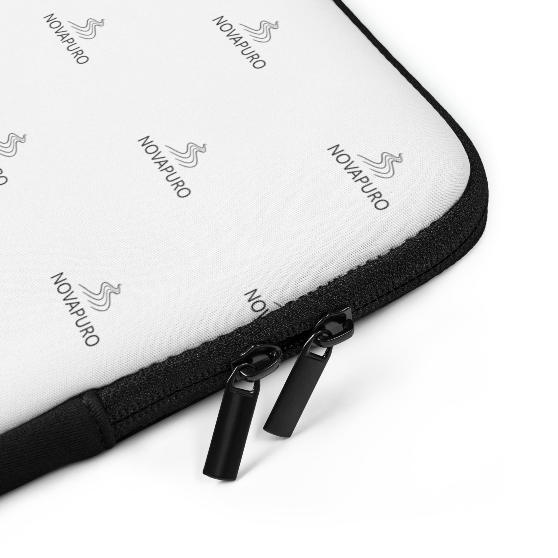 Premium white laptop sleeve featuring a repeating black Novapuro logo pattern, minimalist Scandinavian tech accessory with faux fur lining.