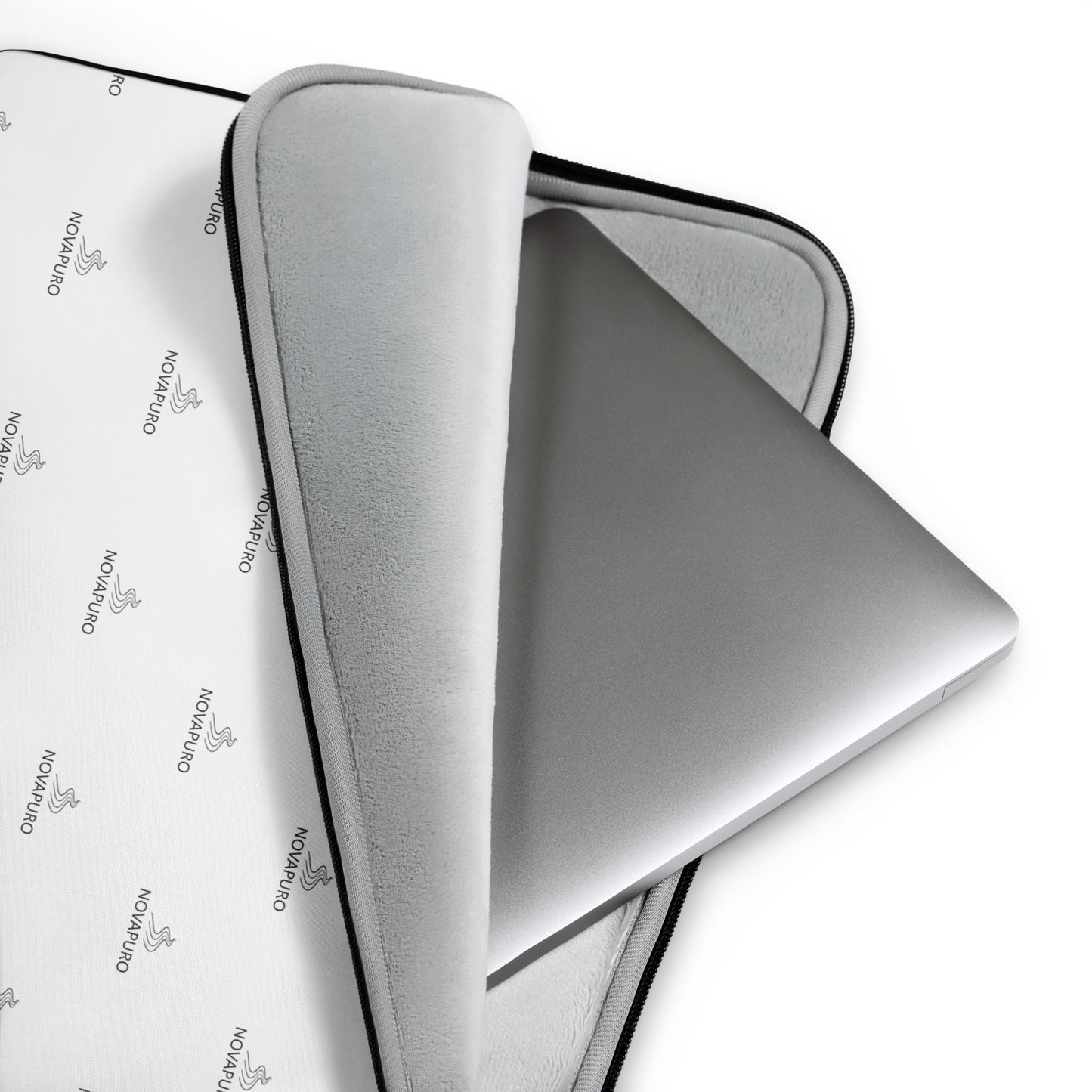 Premium white laptop sleeve featuring a repeating black Novapuro logo pattern, minimalist Scandinavian tech accessory with faux fur lining.