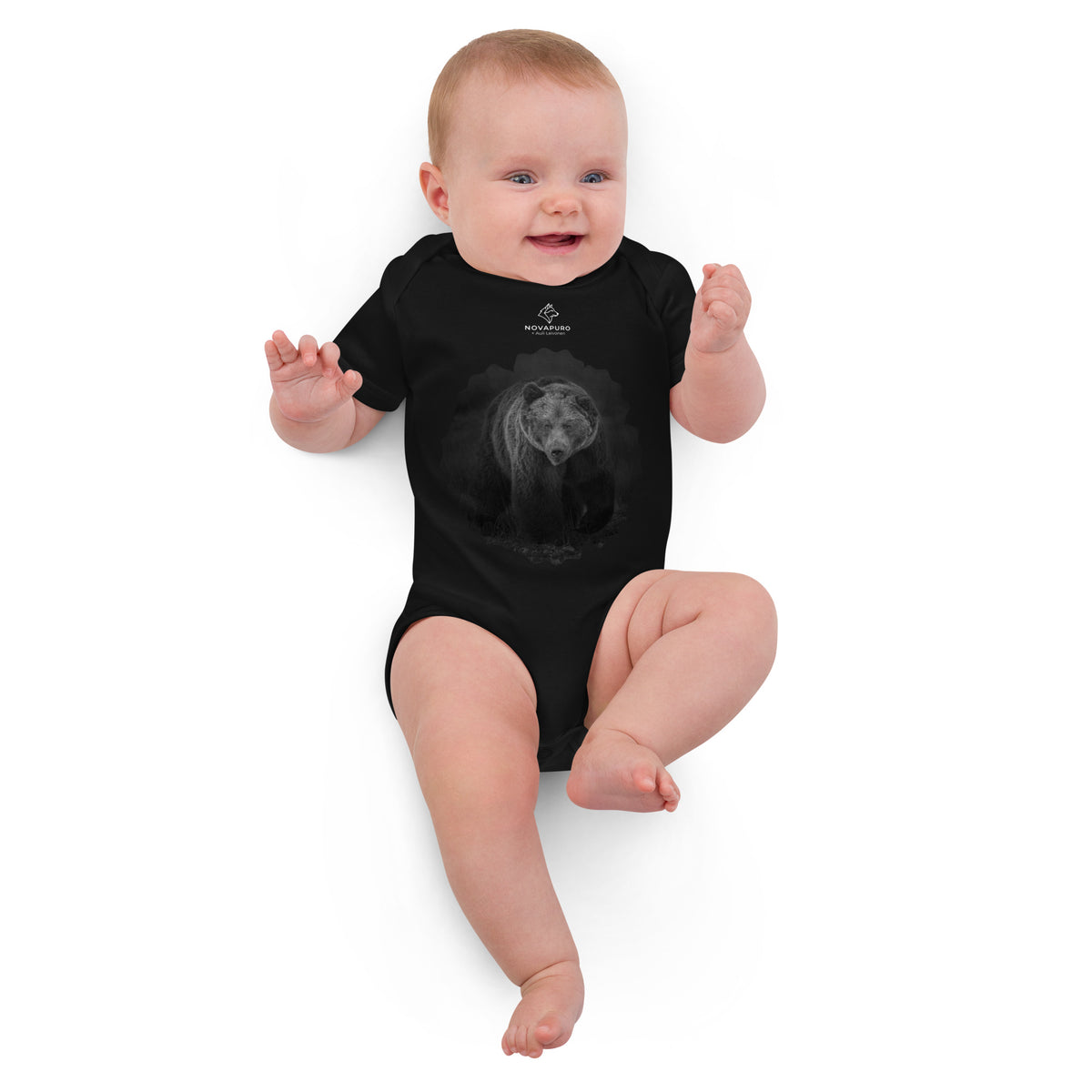 A black organic cotton baby bodysuit featuring a Nordic bear design, an adorable and sustainable collaboration between Novapuro and Auli Leivonen.