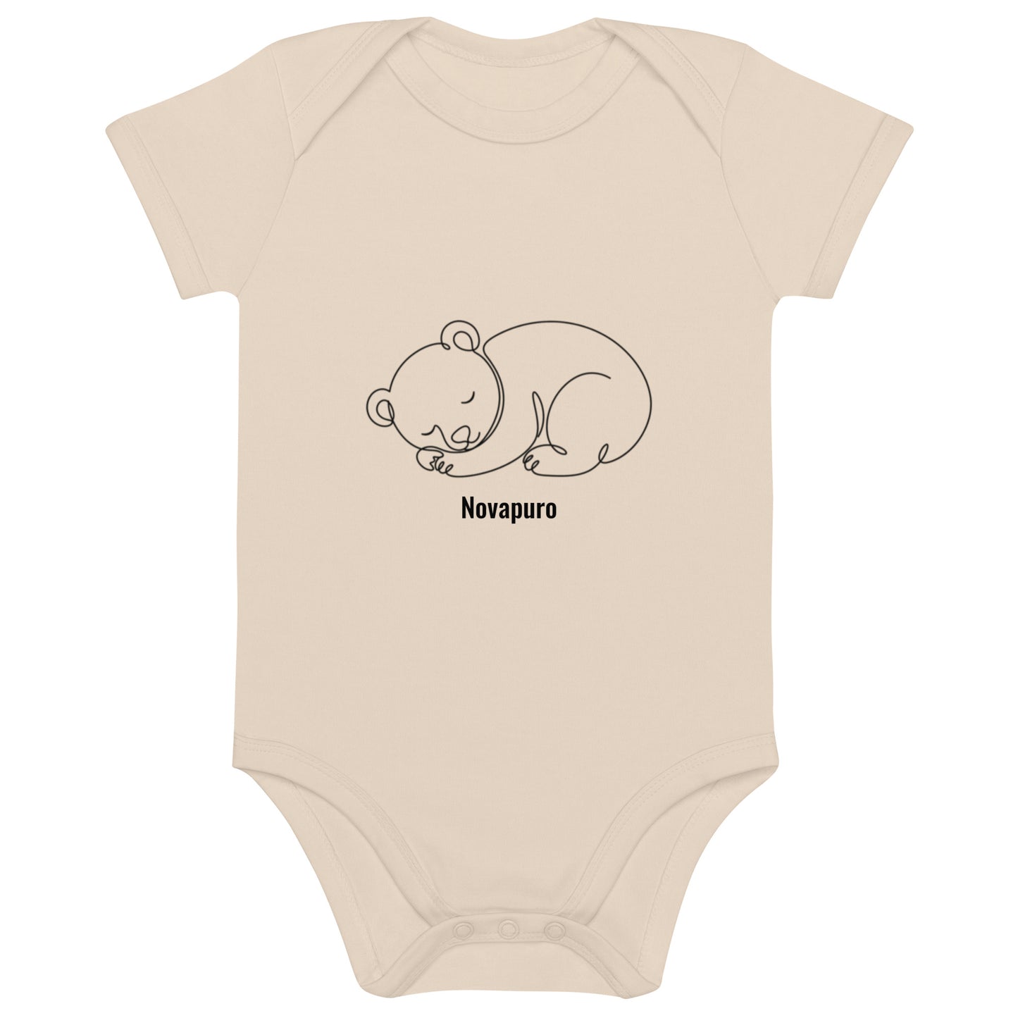Baby wearing a sand-colored organic cotton bodysuit featuring a minimalist continuous line art of a sleeping bear and the Novapuro logo.