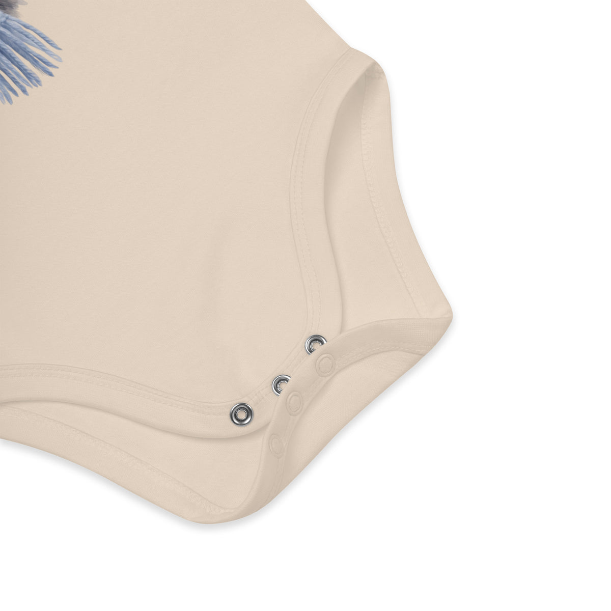Close up of the nickel-free crotch poppers on the Annette Thome Marttinen x Novapuro organic baby bodysuit