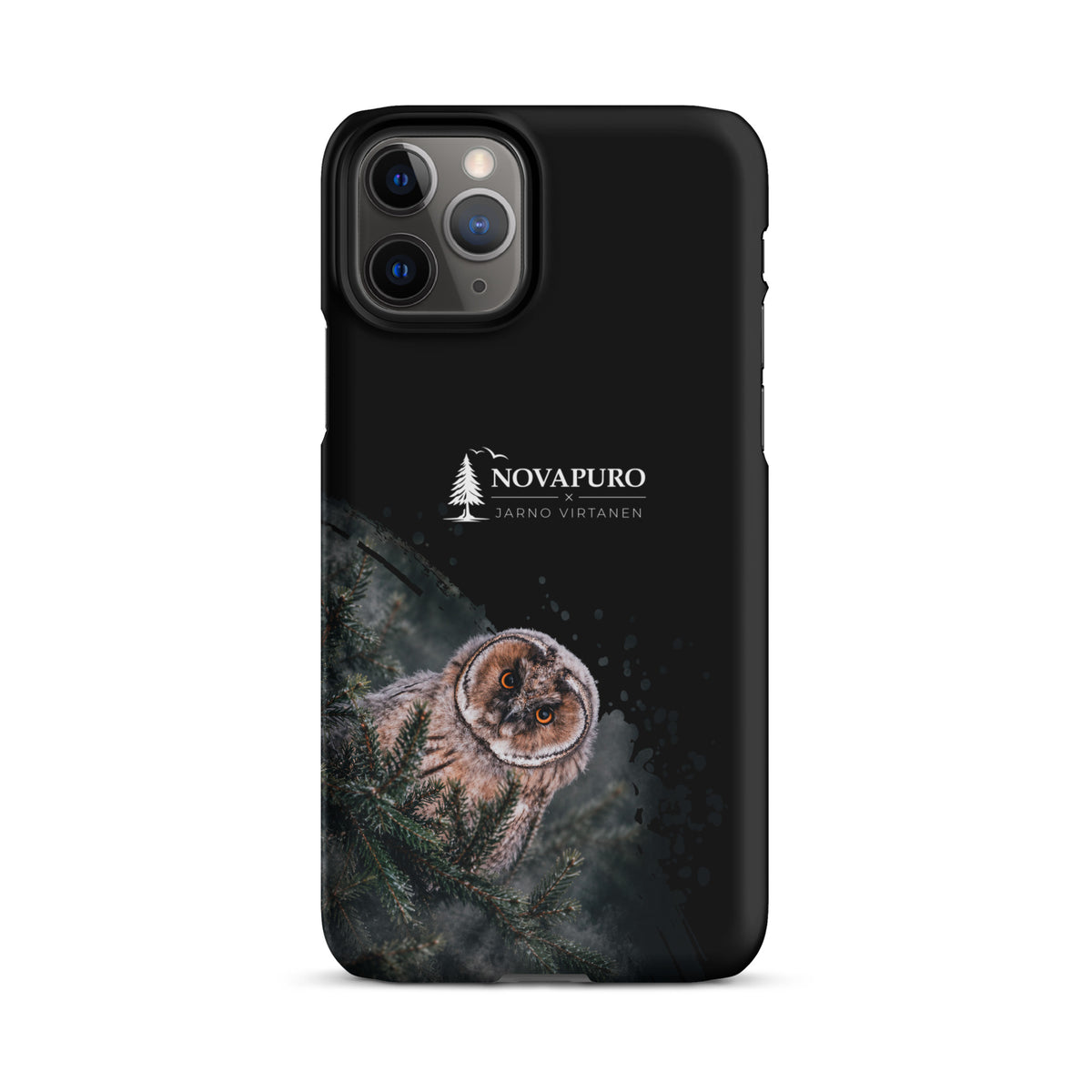 A black snap case for iPhone featuring a Nordic long-eared owl chick print by Jarno Virtanen, displayed flat on a dark surface next to glasses and a watch.