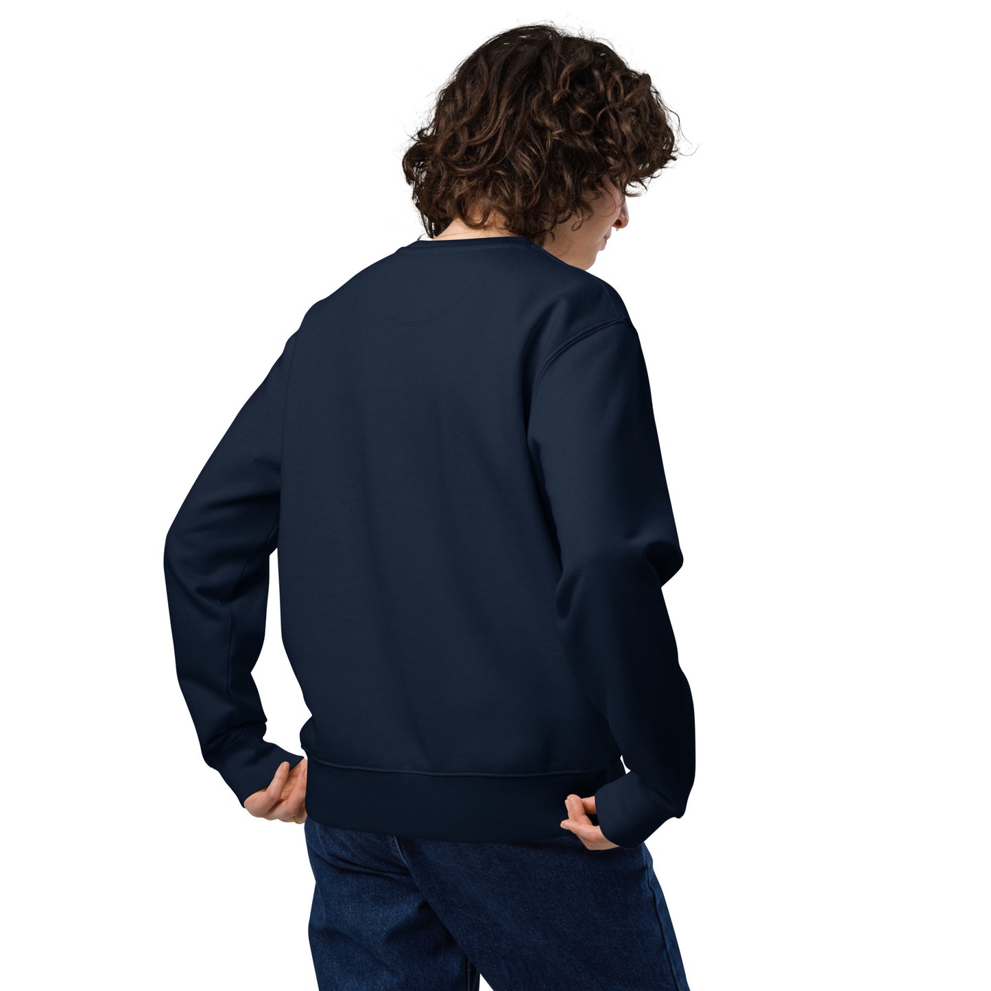 Woman wearing a navy blue Novapuro Forest Floor organic cotton sweatshirt and light blue jeans