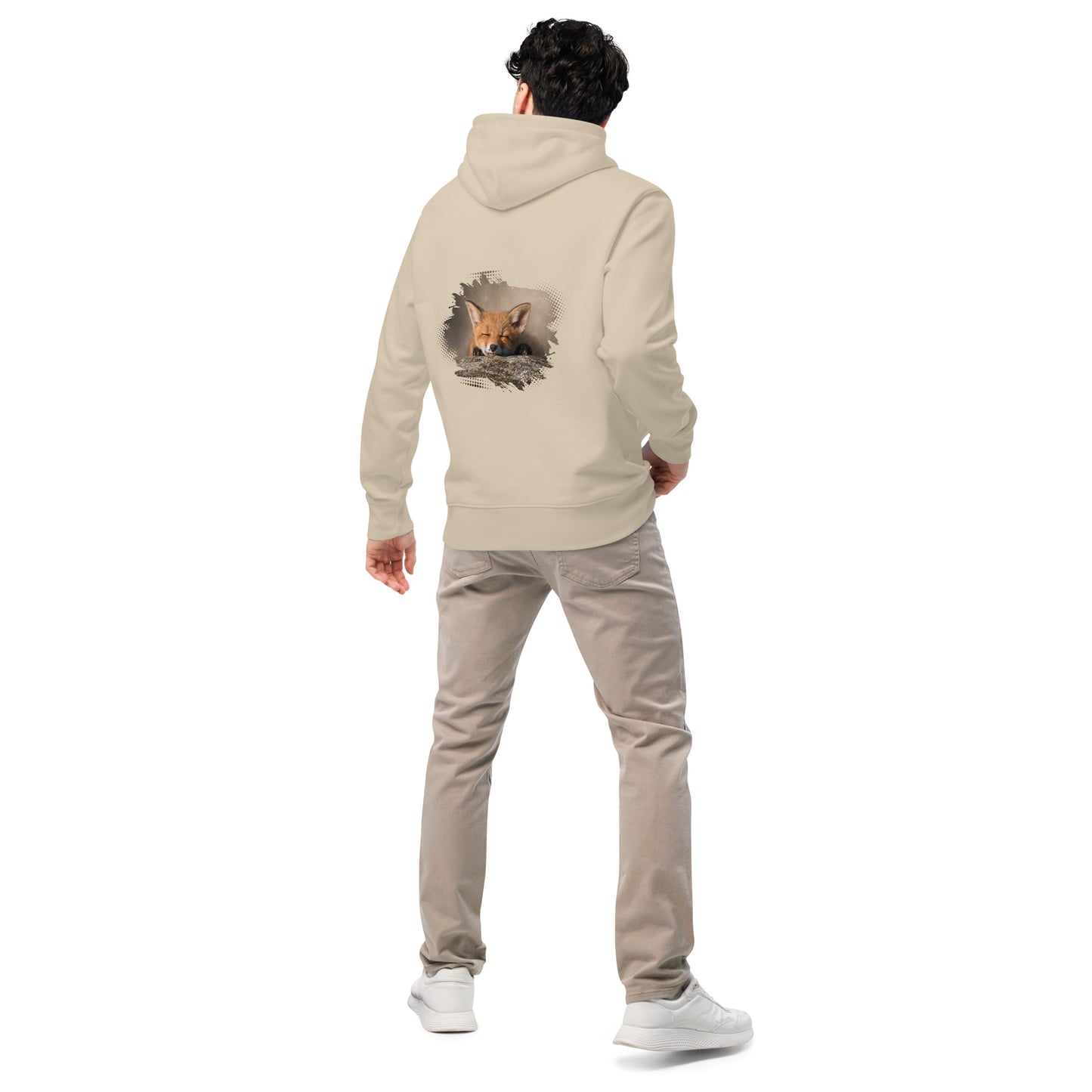 Man wearing a Desert Dust sand-colored Novapuro x Jarno Virtanen organic hoodie featuring a detailed sleeping fox kit artwork on the back, studio shot