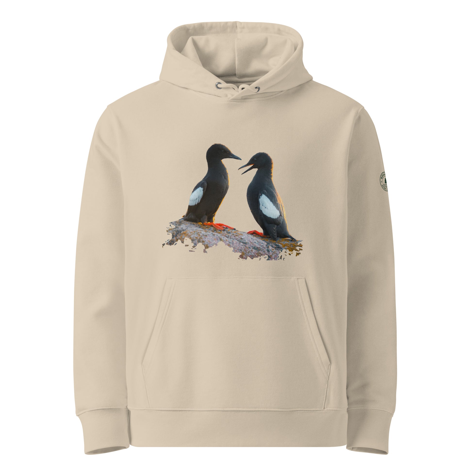 Front view of a female model wearing the sand-colored Jetro Luhtaa x Novapuro organic hoodie featuring a Baltic Guillemots photography print.
