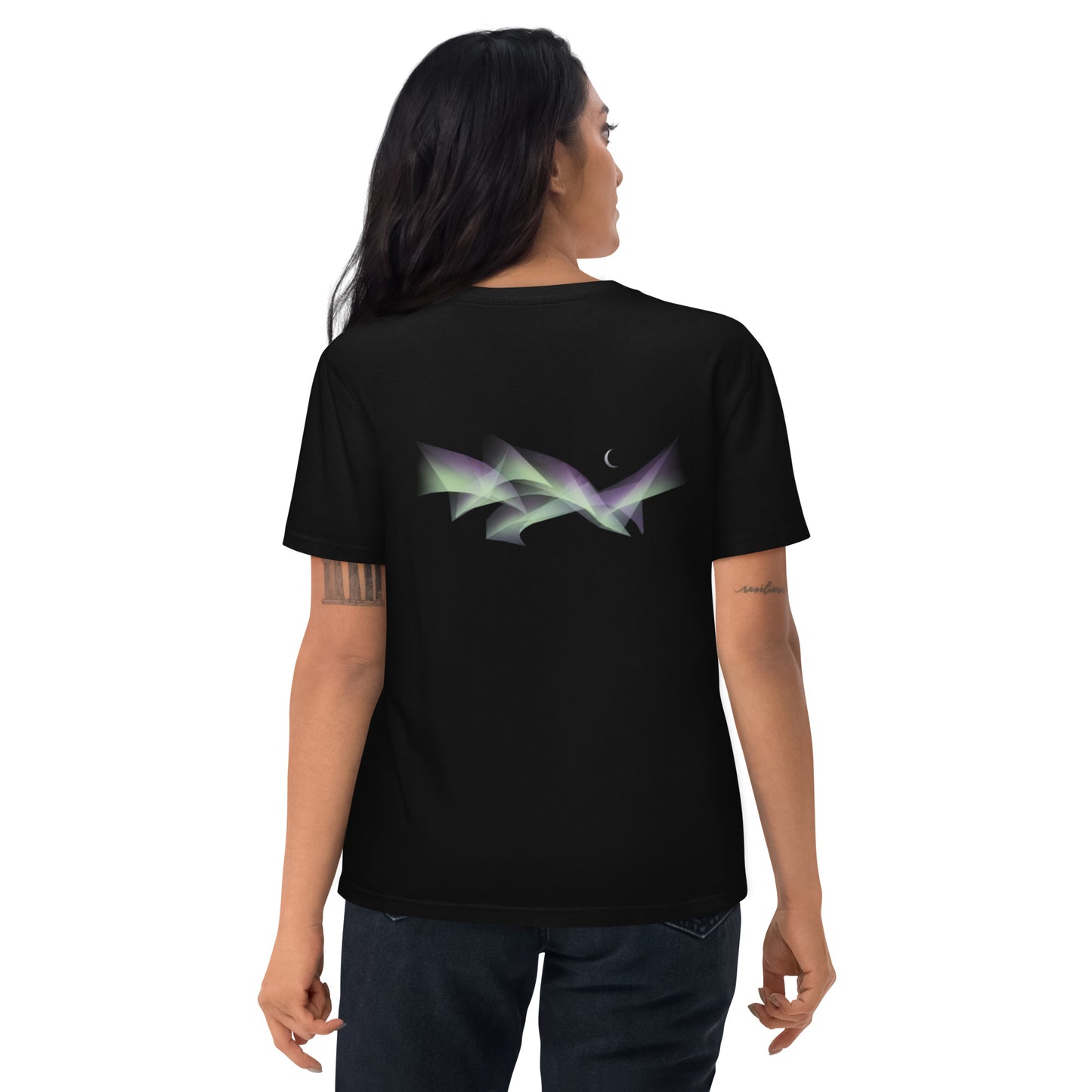 Woman wearing a black Novapuro organic cotton t-shirt featuring an abstract Scandinavian Northern Lights and crescent moon design on the back, studio shot