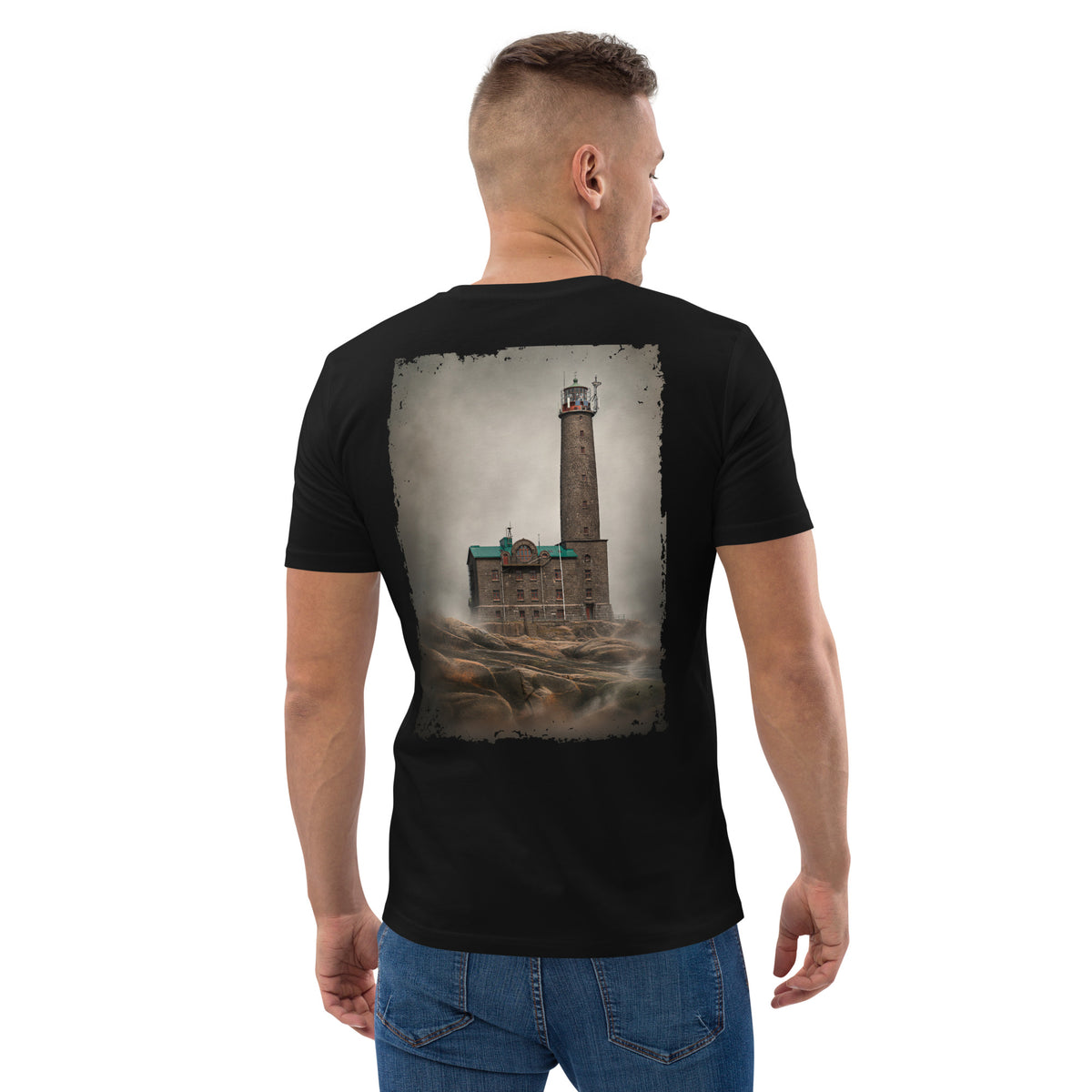 Man wearing a black Novapuro organic eco t-shirt with a historic Bengtskar Lighthouse print on the back by Jarno Virtanen. Sustainable Nordic apparel.