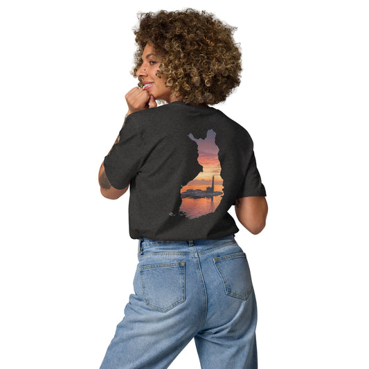 A woman wearing the black Niko Laurila x Novapuro organic cotton t-shirt, showcasing the back print of a lighthouse photograph masked inside a silhouette of Finland.   