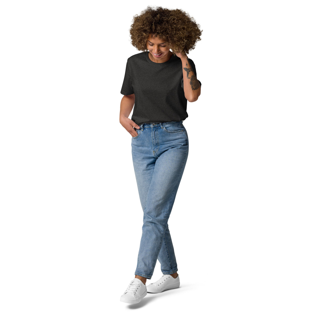 Front view of a woman wearing the black medium fit Niko Laurila x Novapuro organic eco t-shirt, highlighting its clean, minimalist front design.   