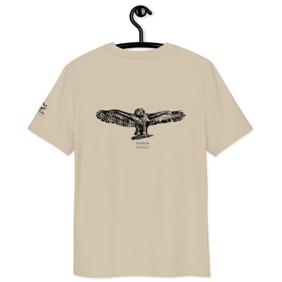 Detailed view of a premium beige eco-friendly t-shirt on a hanger, featuring a majestic Eagle Owl illustration. Made from GOTS-certified organic cotton with minimalist Scandinavian aesthetics.
