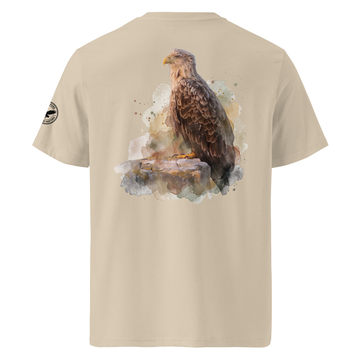 Back view of a person wearing a desert-colored organic cotton t-shirt featuring an artistic white-tailed eagle wildlife print by Annette Thome Marttinen x Novapuro.