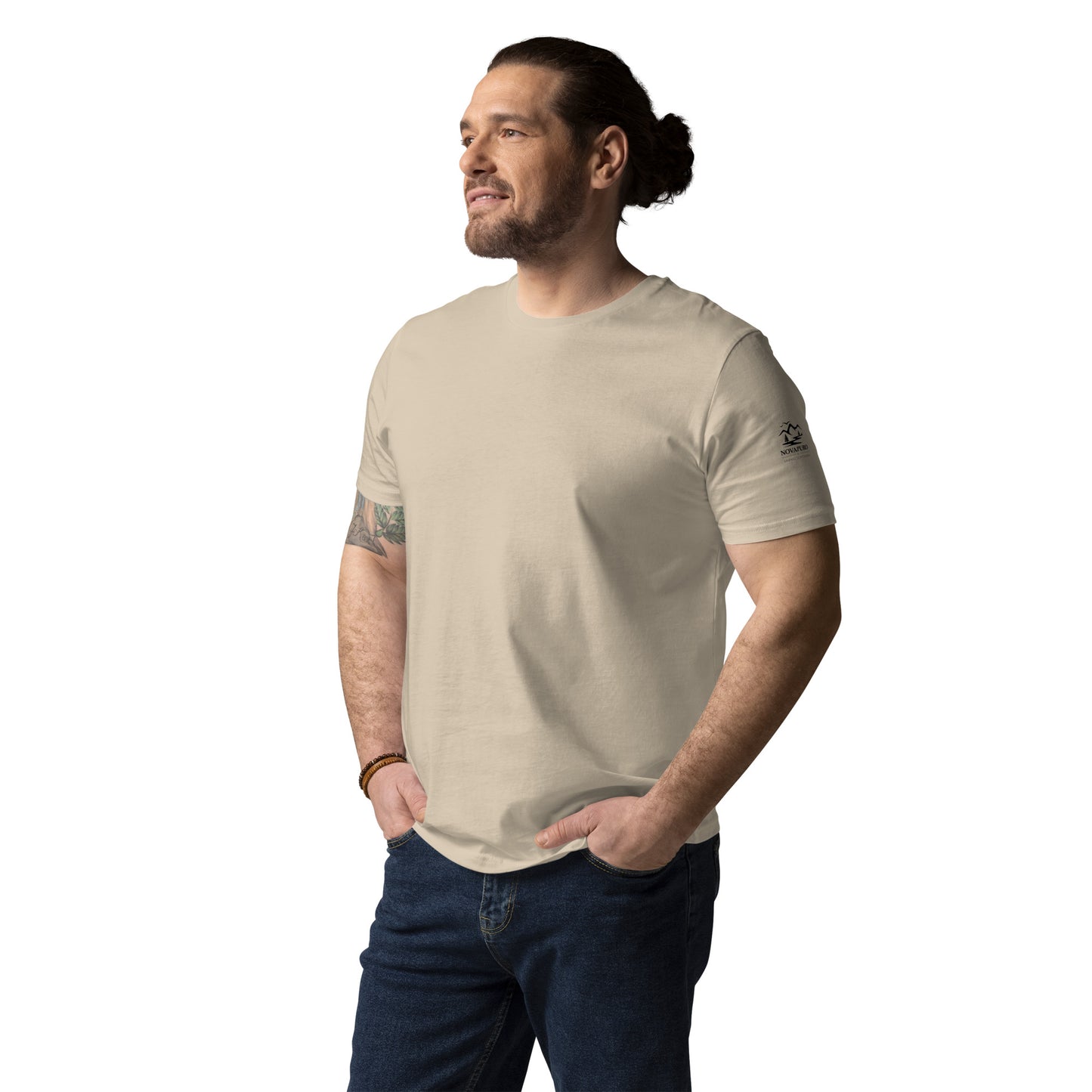 Front view of a man wearing the minimalist sand-colored organic cotton eco t-shirt from the Novapuro x Jarno Virtanen wildlife collection.