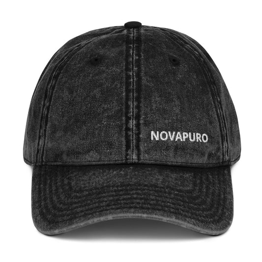 Novapuro "Legacy" Vintage Cap in distressed black cotton with embroidered logo. Unstructured dad hat with antique brass buckle.