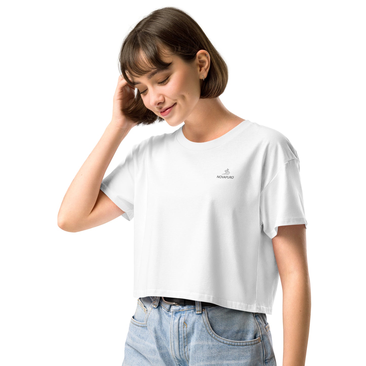 Woman wearing a crisp white Novapuro signature crop top made of premium combed cotton