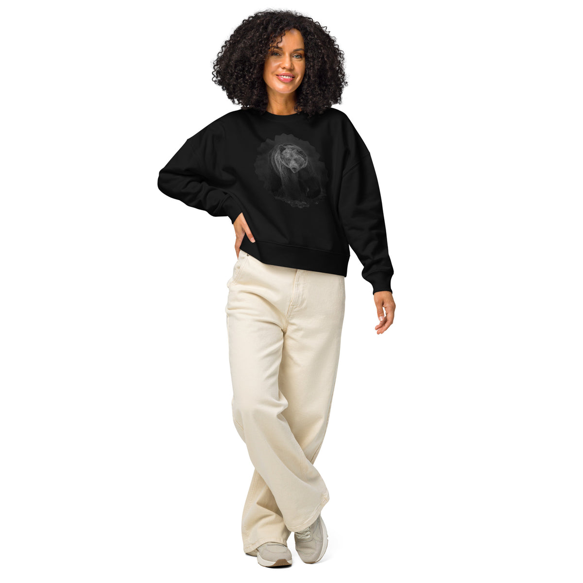 Black women's organic crew neck sweatshirt featuring a Nordic bear design and a subtle neck logo, a sustainable collaboration between Novapuro and Auli Leivonen.