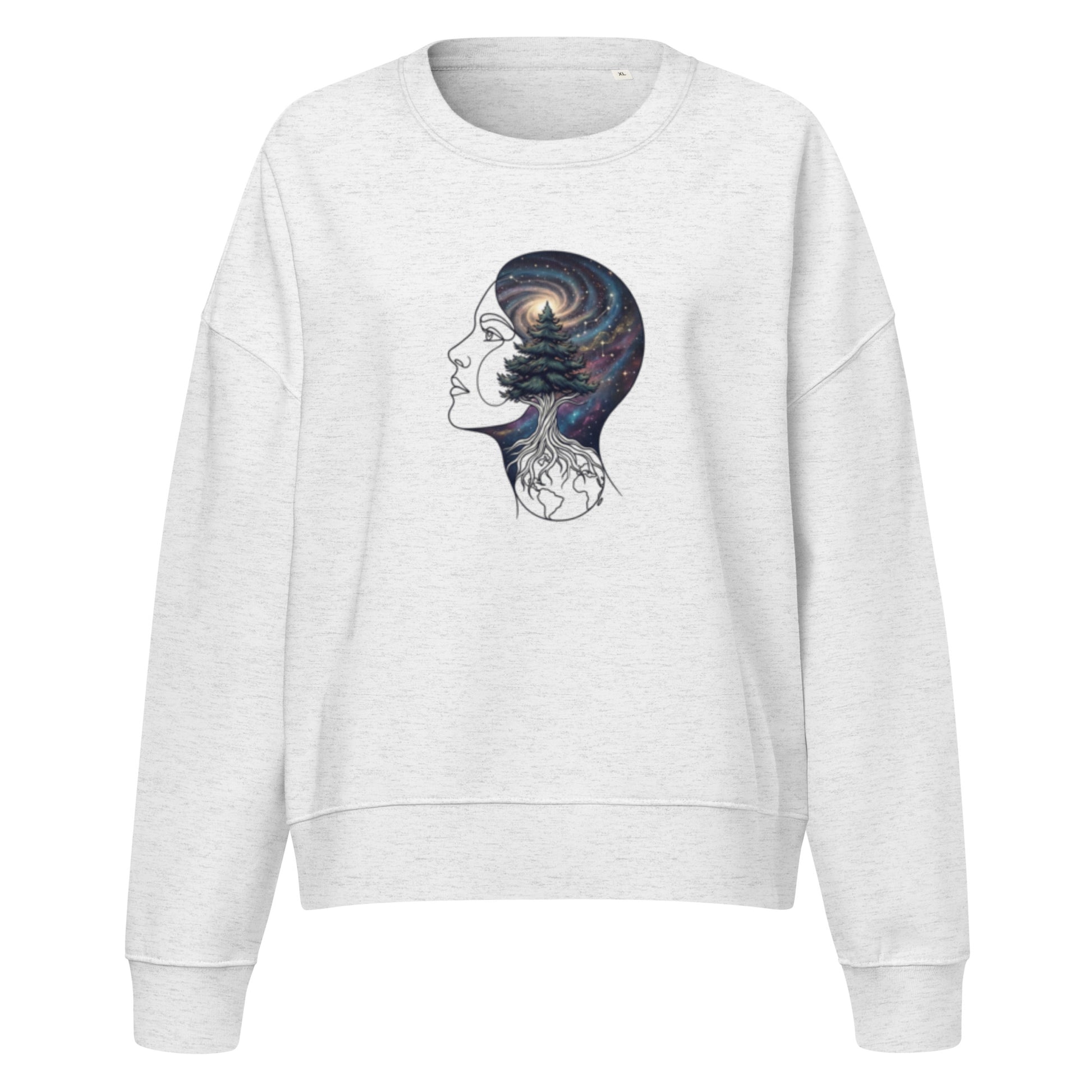 Front view of a white women's sustainable crew neck sweatshirt displaying a mystical starry night and pine forest silhouette graphic.